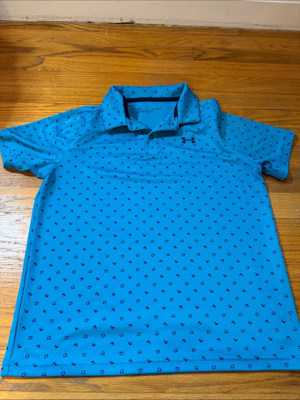Under Armour boys Teal Blue Polo with small flower print
